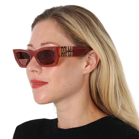 miu miu sunglasses butterfly|Miu Miu Dark Violet Butterfly Ladies Sunglasses MU 09WS .